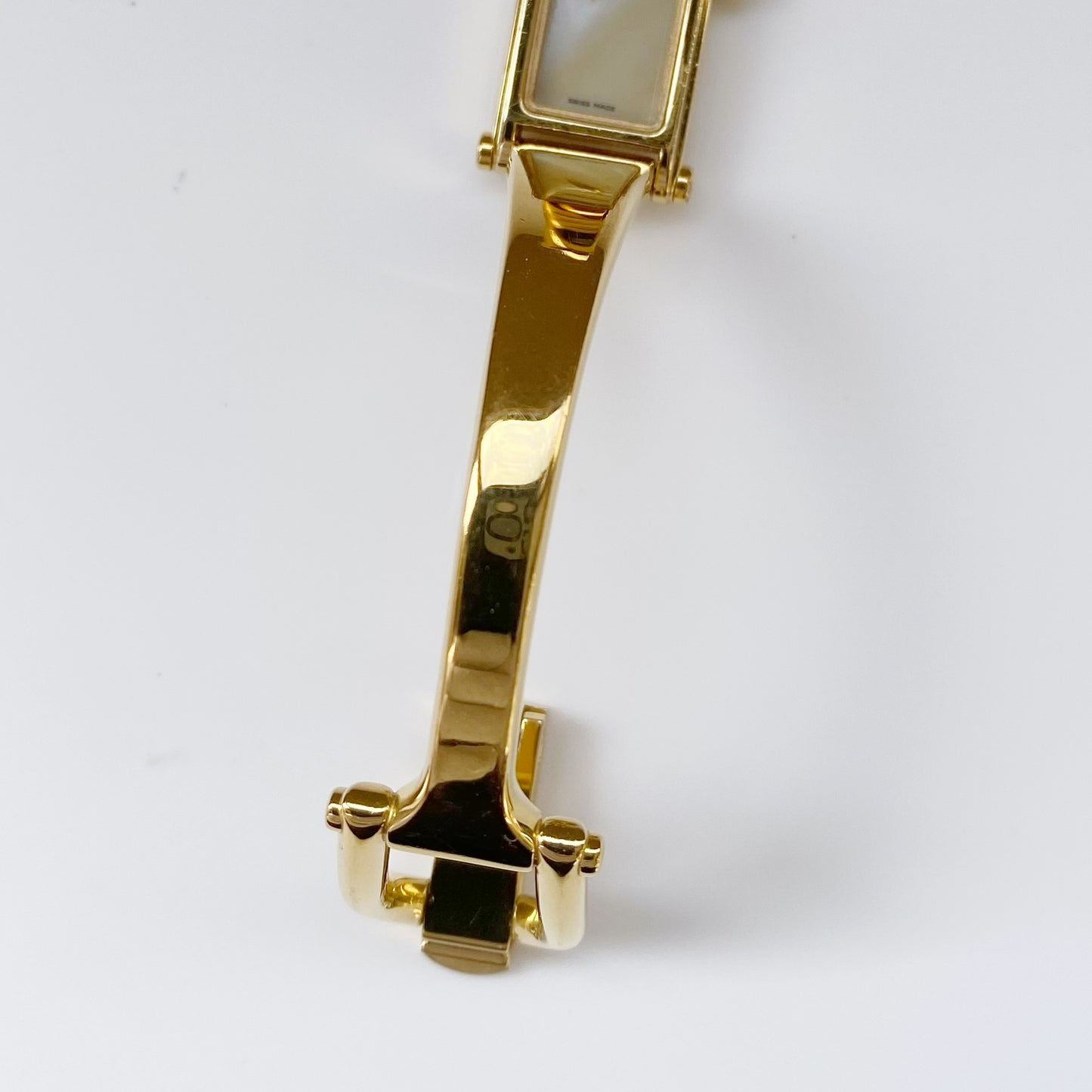 Gucci 1990s Rectangular Seashell Dial Gold Plated Bangle Watch