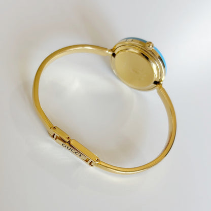 Gucci 1990s Interchangeable Bezel Gold Plated Bangle Watch with 12 bezels, case