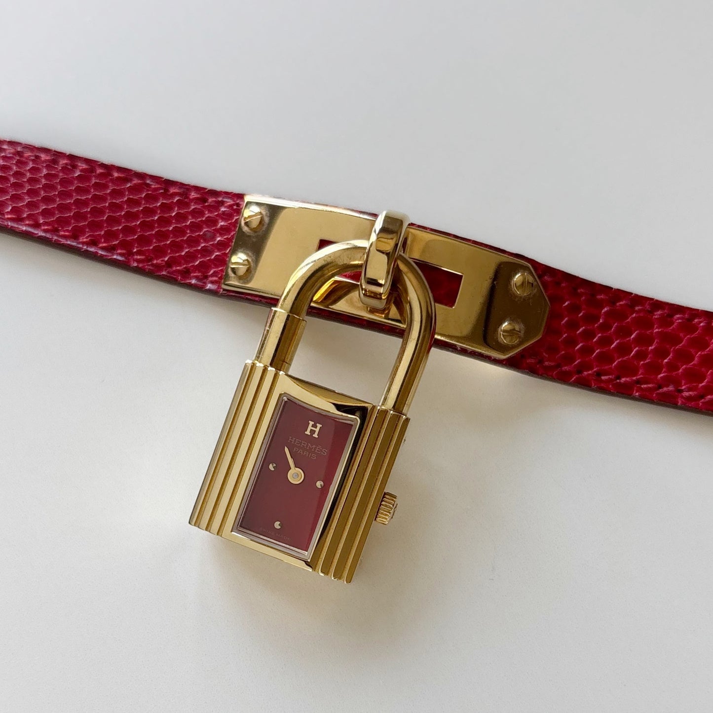 Hermes 1990s Kelly Red Dial Gold Plated Watch
