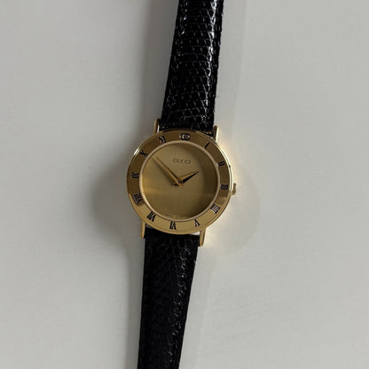 Gucci 1990s Round Dial Gold Plated Watch