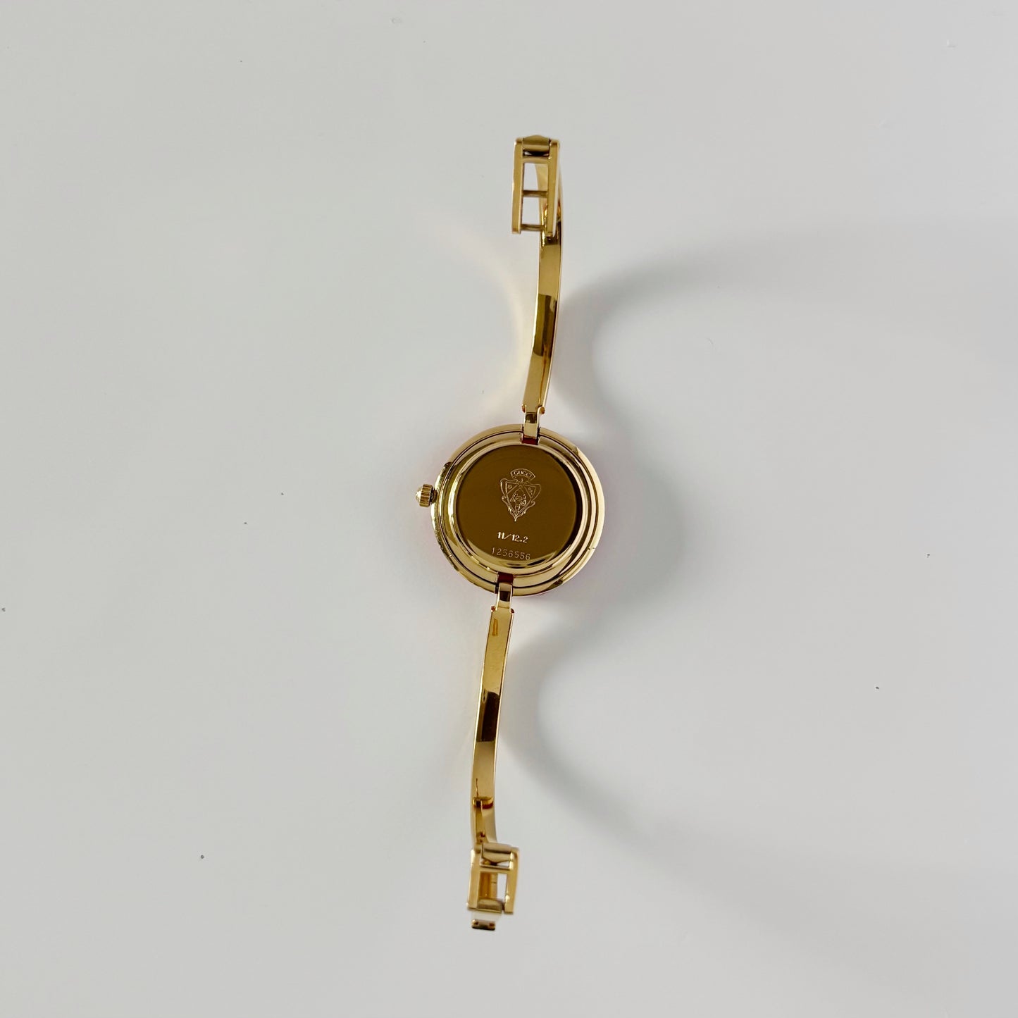 Gucci 1990s Interchangeable Bezel Gold Plated Bangle Watch with 12 bezels, case (Small)