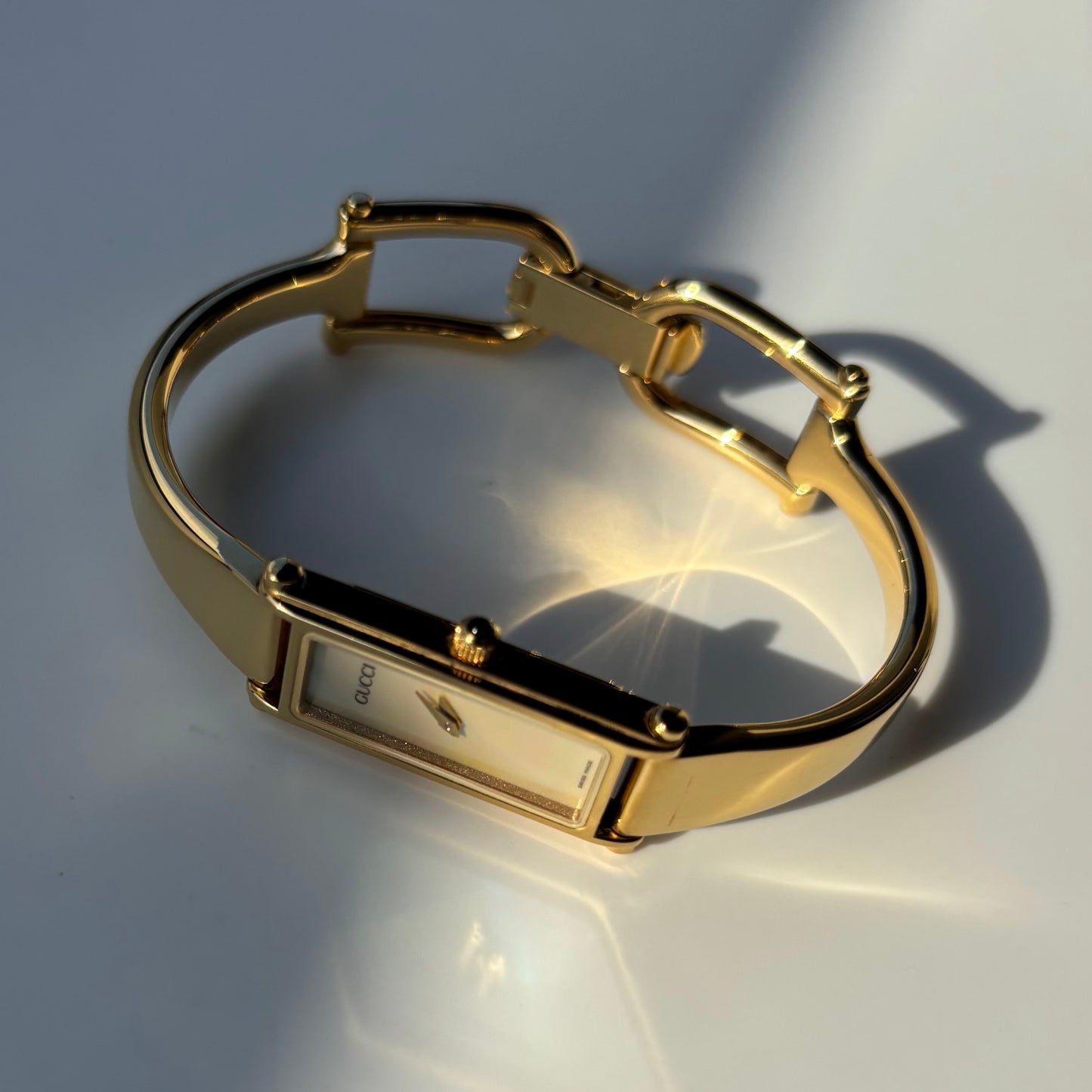 Gucci 1990s Seashell Dial Rectangular Gold Plated Bangle Watch