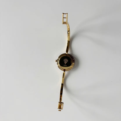 Gucci 1990s Interchangeable Bezel Gold Plated Bangle Watch with 12 bezels, case