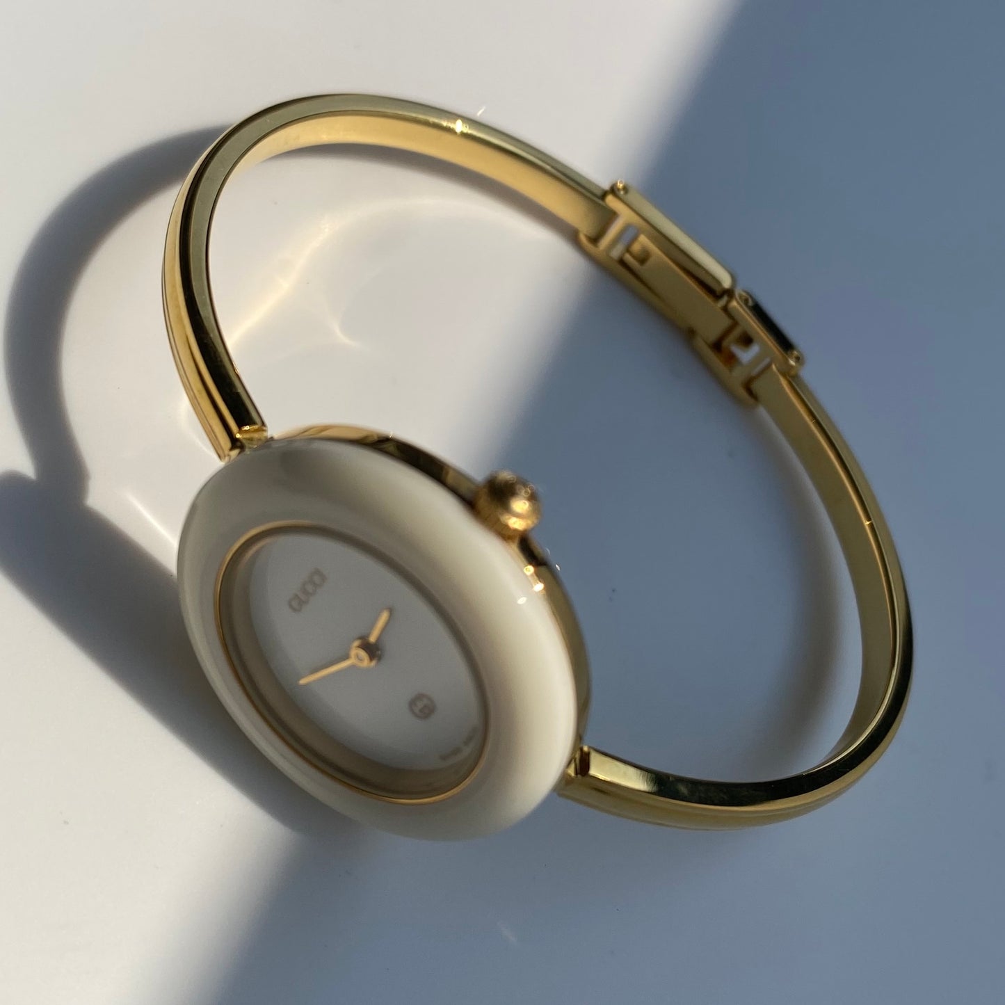Gucci 1990s Interchangeable Bezel Gold Plated Bangle Watch with 12 bezels, case