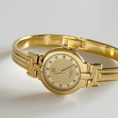 Givenchy 1990s Round Dial Gold Plated Bangle Watch