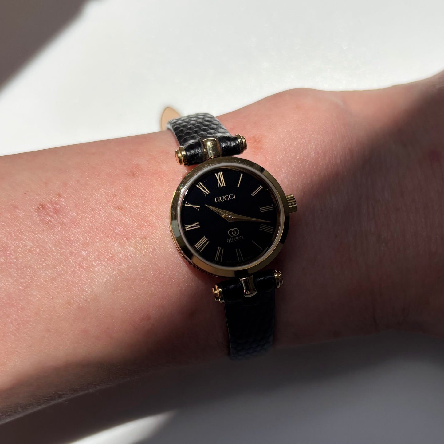 Gucci 1980s Black Round Dial Gold Plated Watch