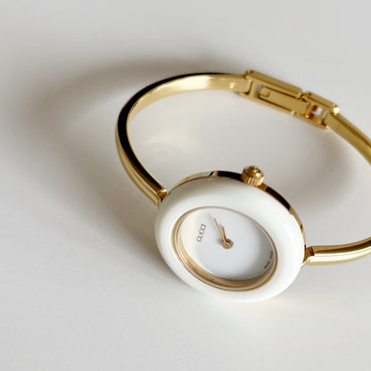 Gucci 1990s Interchangeable Bezel Gold Plated Watch with 12 bezels, case (Small)