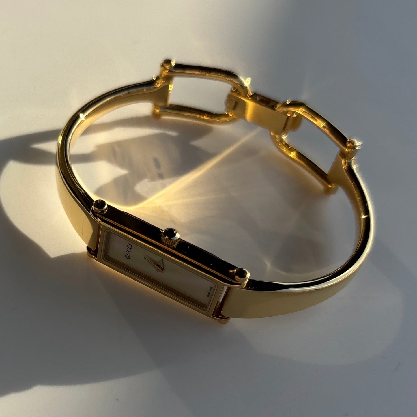 Gucci 1990s Seashell Dial Rectangular Gold Plated Bangle Watch