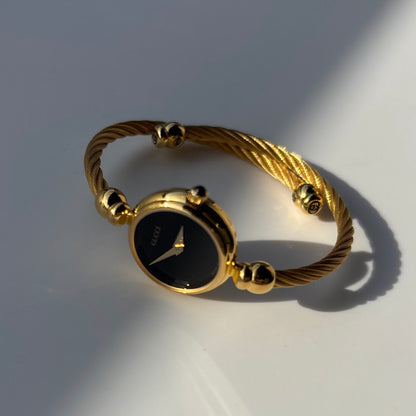 Gucci 1990s Black Dial Gold Plated Cable Band Bangle Watch
