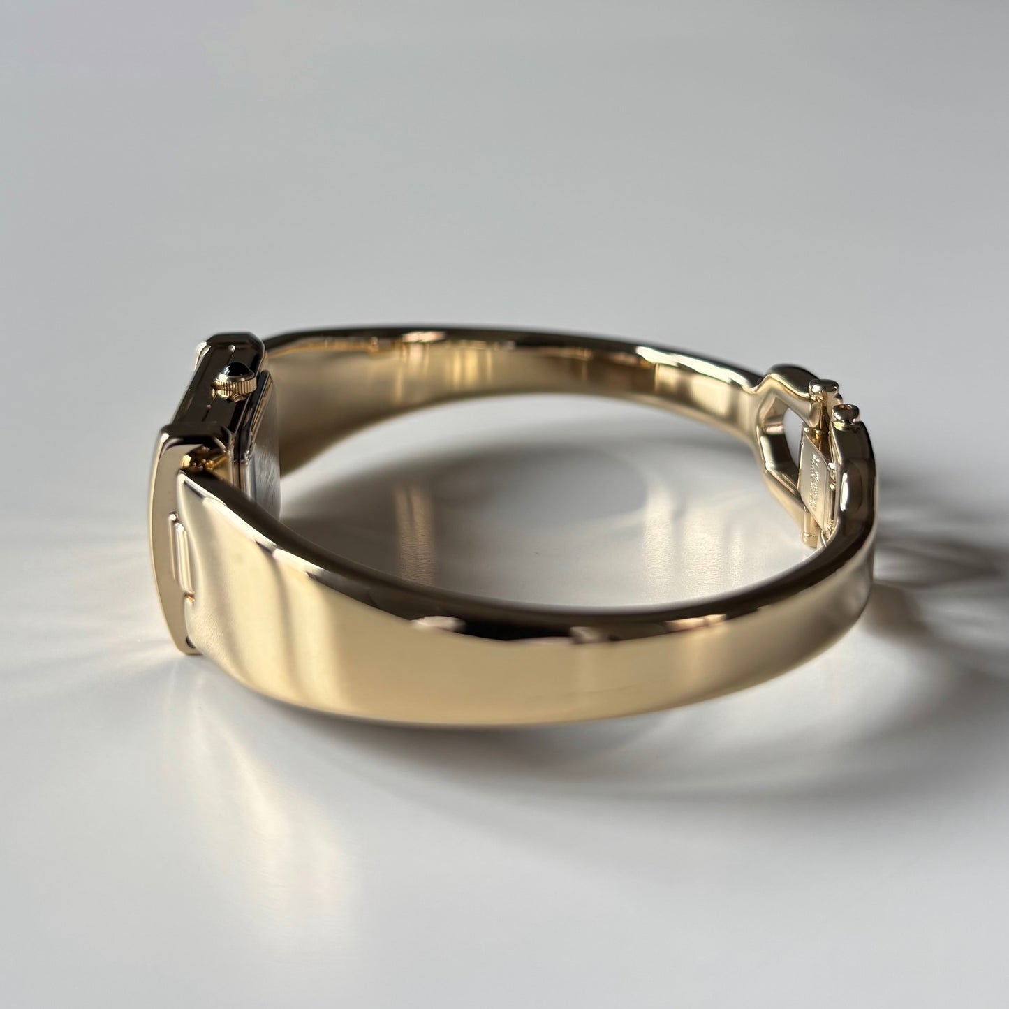 Yves Saint Laurent 1990s Peek-A-Boo Gold Plated Bangle Watch