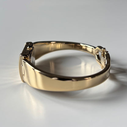 Yves Saint Laurent 1990s Peek-A-Boo Gold Plated Bangle Watch