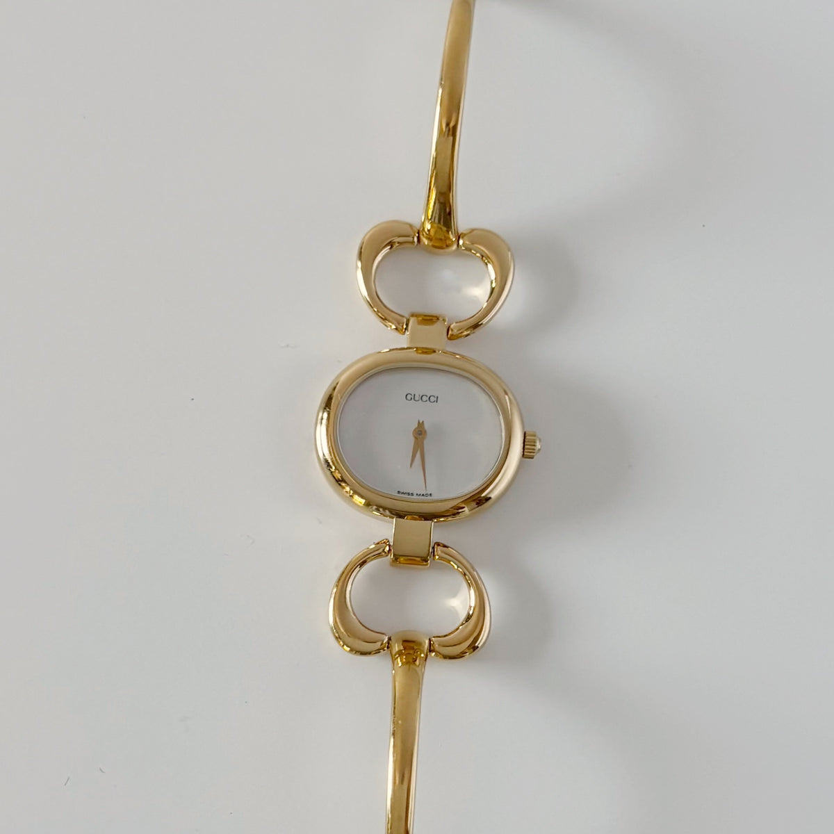Gucci 1990s Seashell Oval Dial Gold-Plated Bangle Watch (Small)