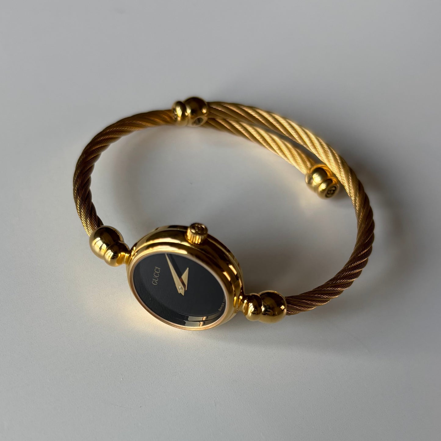 Gucci 1990s Black Dial Gold Plated Cable Bangle Watch