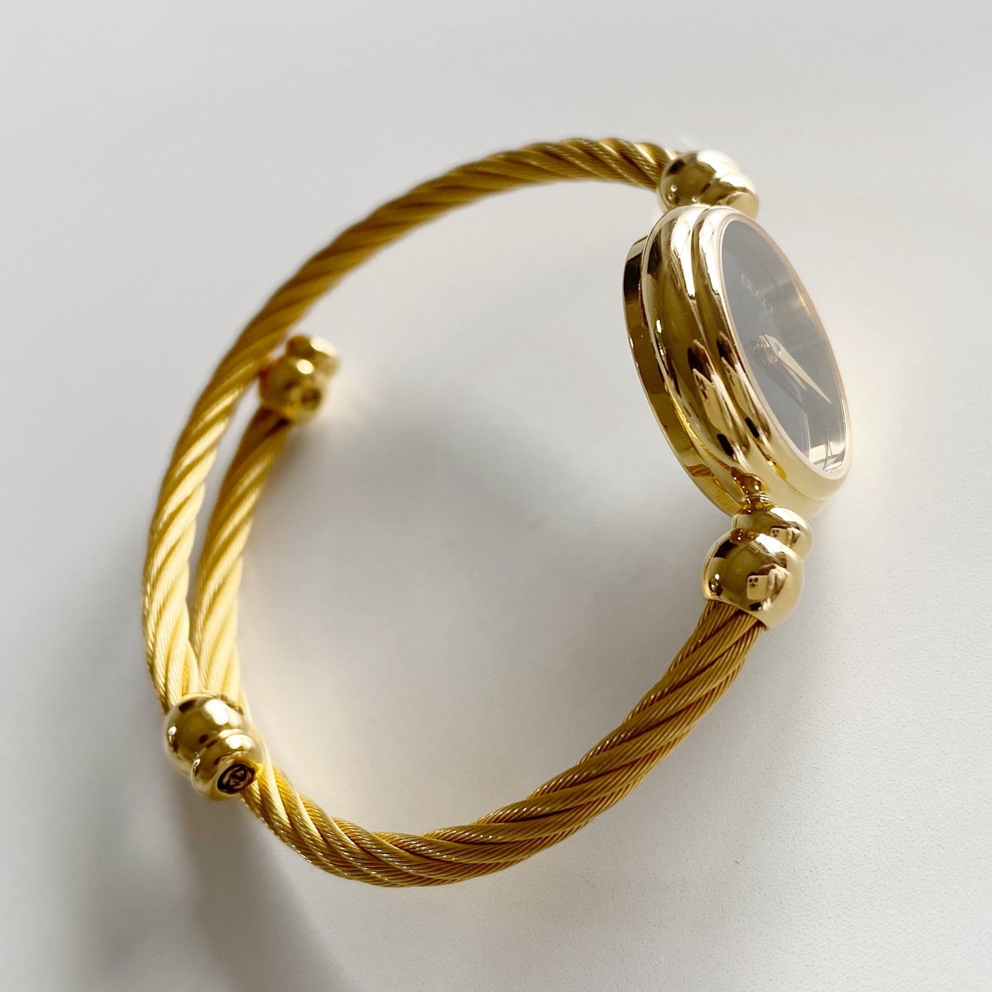 Gucci 1990s Black Dial Gold Plated Cable Bangle Watch