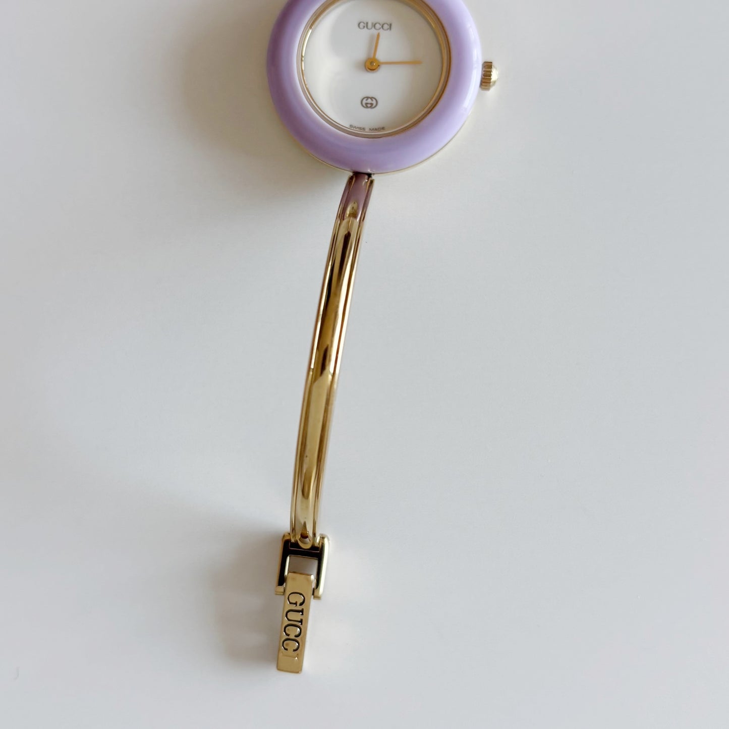 Gucci 1990s Interchangeable Bezel Gold Plated Bangle Watch with 12 bezels, case