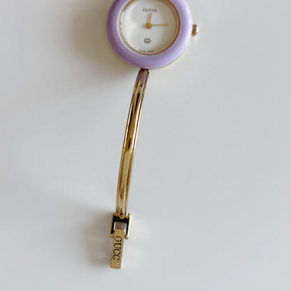 Gucci 1990s Interchangeable Bezel Gold Plated Bangle Watch with 12 bezels, case