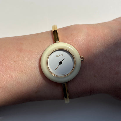 Gucci 1990s Interchangeable Bezel Gold Plated Bangle Watch with 12 bezels, case