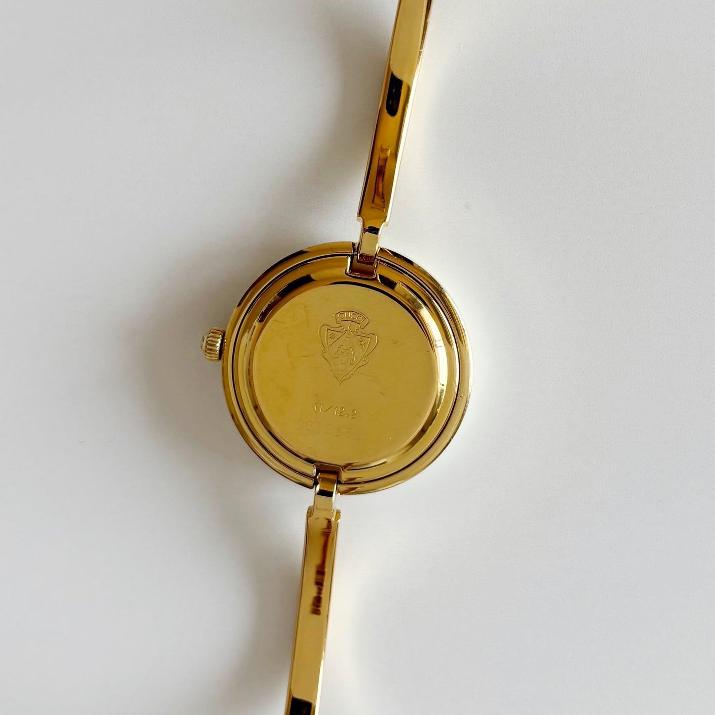 Gucci 1990s Interchangeable Bezel Gold Plated Bangle Watch with 12 bezels, case