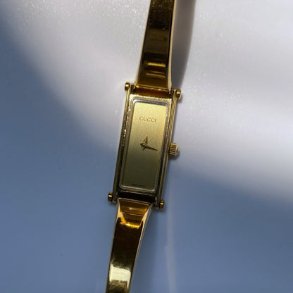 Gucci 1990s Rectangular Gold Plated Bangle Watch (Small)