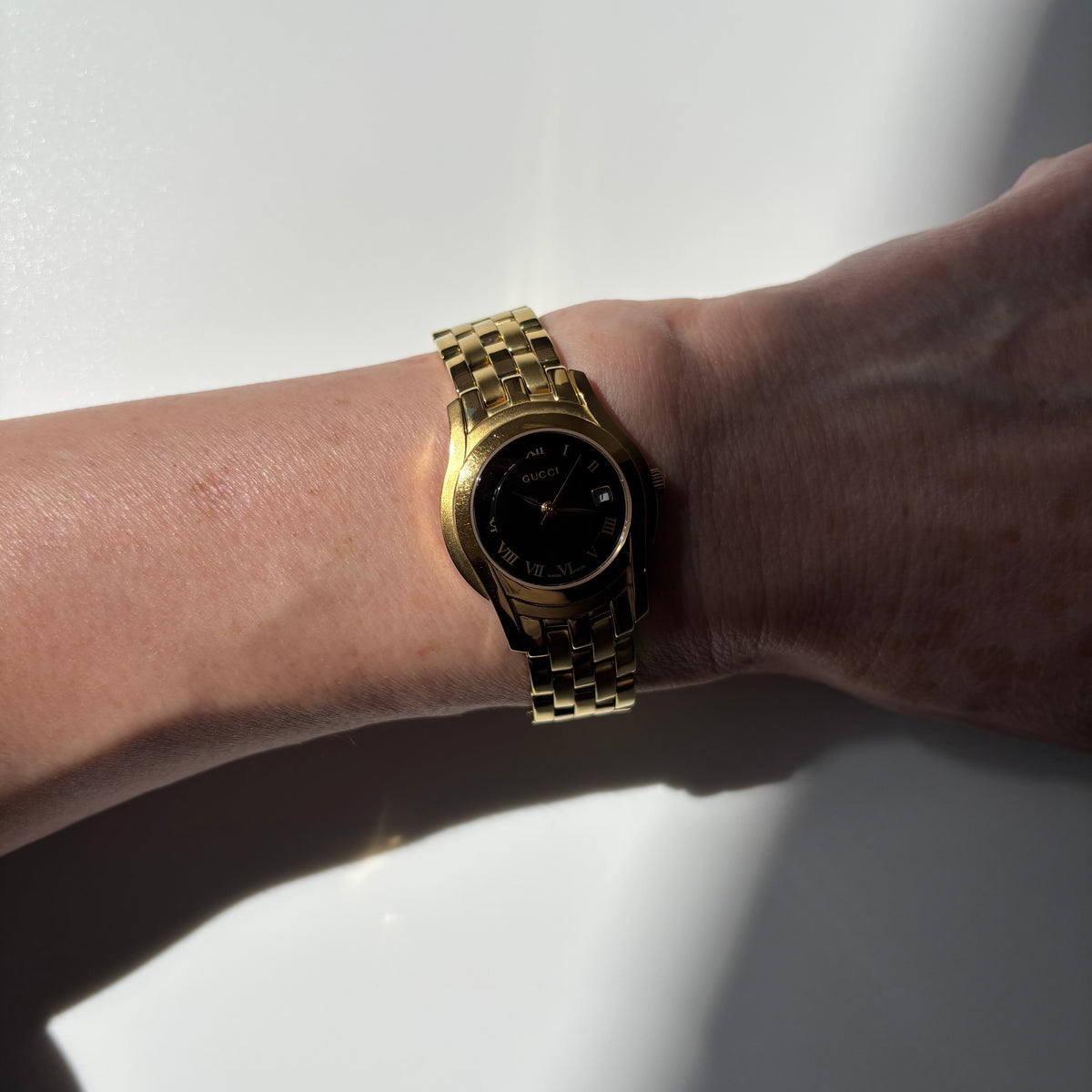 Gucci 1990s Date Black Round Dial Gold-Plated Watch
