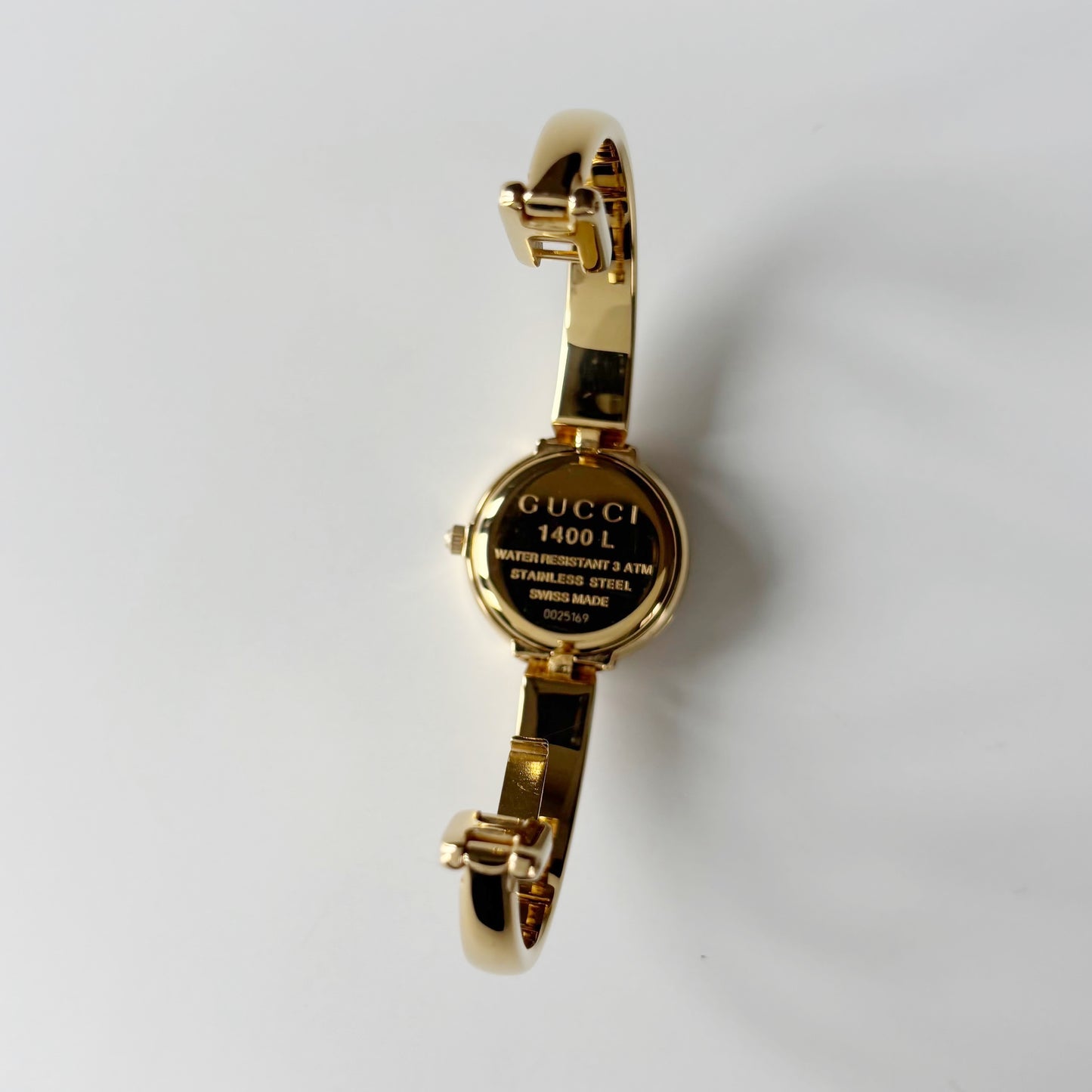 Gucci 1990s Round Dial Gold Plated Bangle Watch