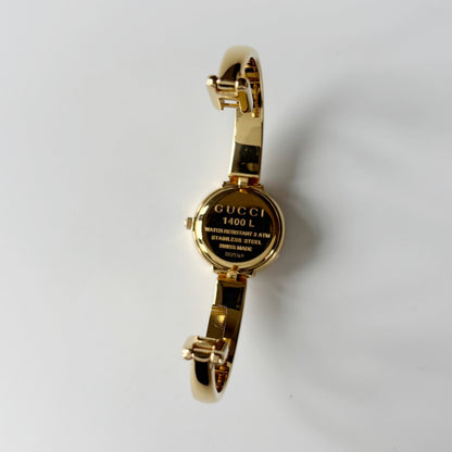 Gucci 1990s Round Dial Gold Plated Bangle Watch