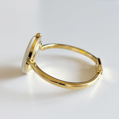 Gucci 1990s Interchangeable Bezel Gold Plated Bangle Watch with 12 bezels, case (Small)