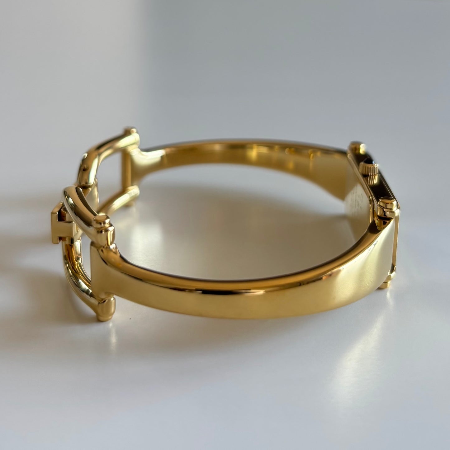Gucci 1990s Black Dial Gold Plated Bangle Watch