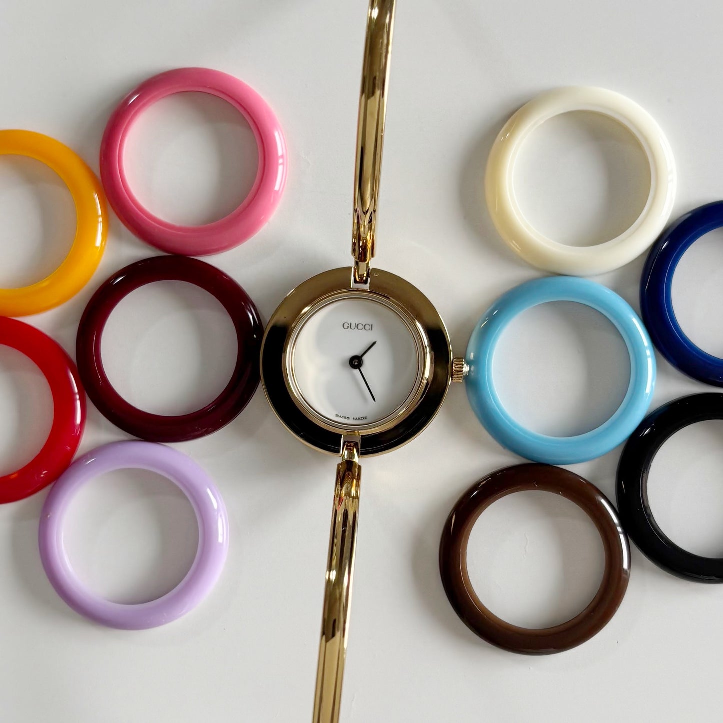 Gucci 1990s Interchangeable Bezel Gold Plated Bangle Watch with 12 bezels, case