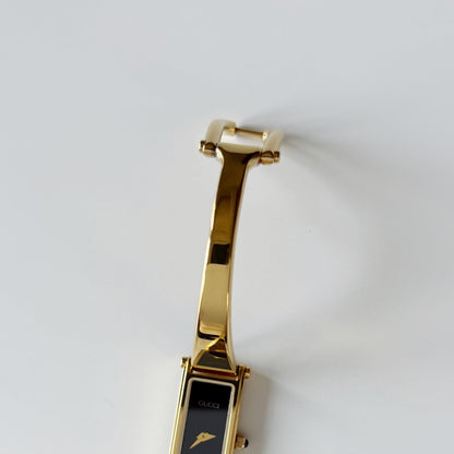 Gucci 1990s Black Dial Gold Plated Bangle Watch
