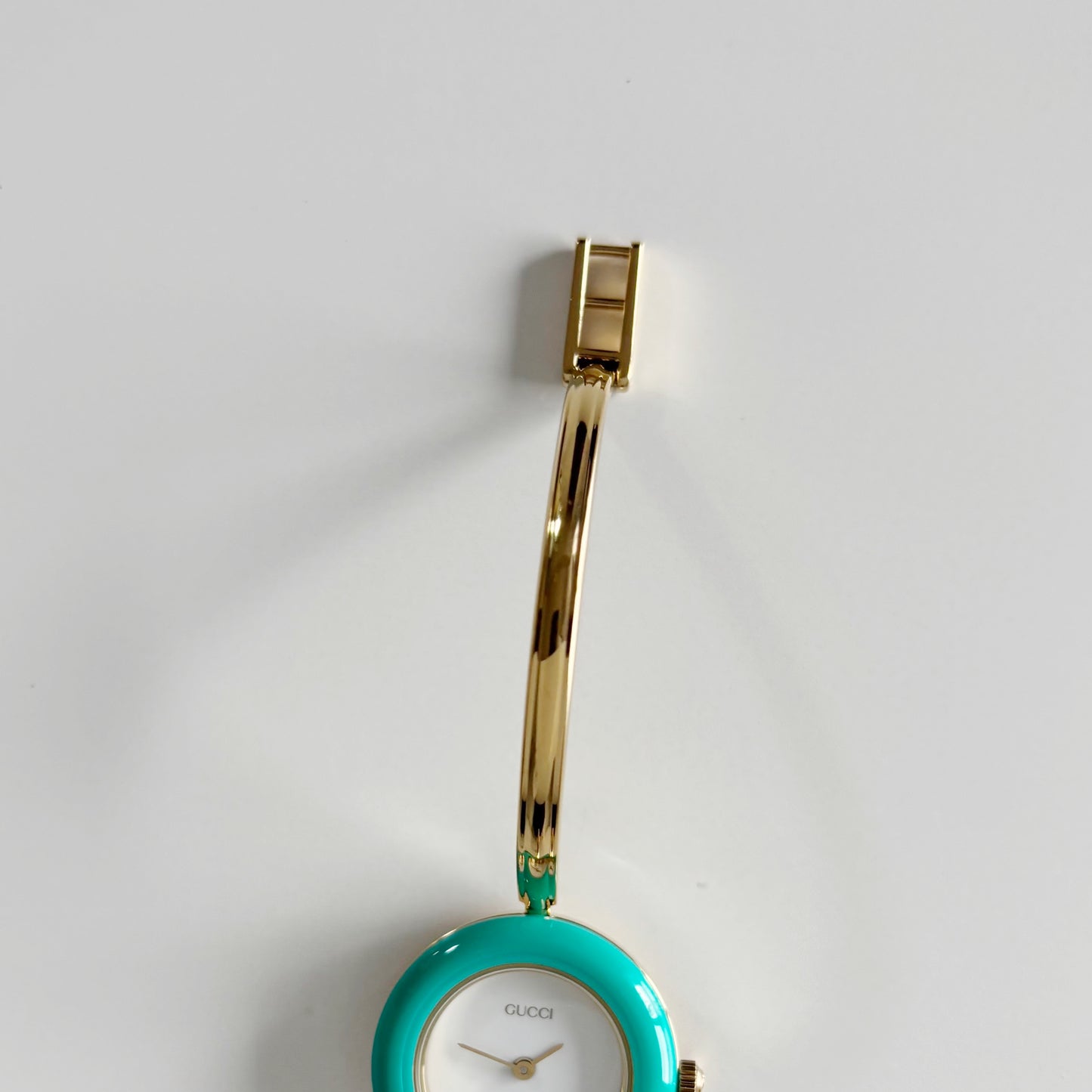Gucci 1990s Interchangeable Bezel Gold Plated Bangle Watch with 12 bezels, case