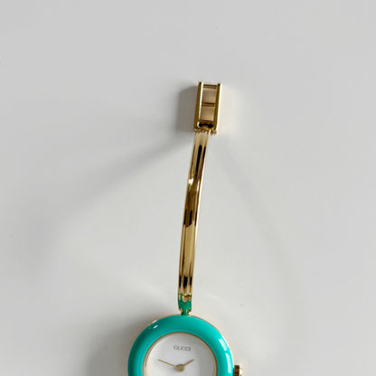 Gucci 1990s Interchangeable Bezel Gold Plated Bangle Watch with 12 bezels, case