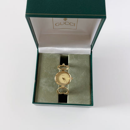 Gucci 1990s Oval Gold Dial Gold Plated Bangle Watch (Small)