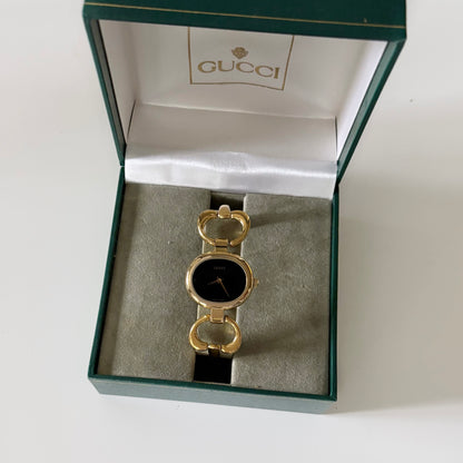 Gucci 1990s Black Dial Gold Plated Bangle Watch