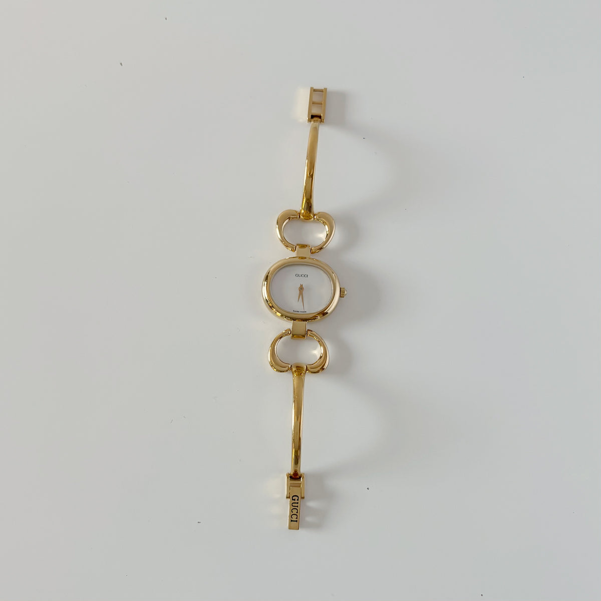 Gucci 1990s Seashell Oval Dial Gold-Plated Bangle Watch (Small)