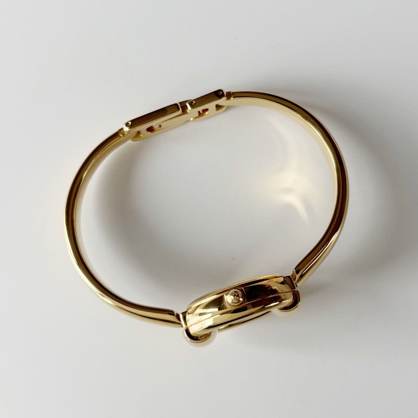 Gucci 1990s Round Dial Gold Plated Bangle Watch