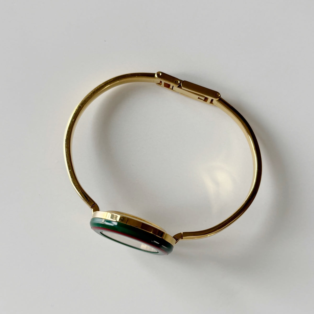 Gucci 1990s Interchangeable Bezel Gold Plated Bangle Watch with 12 bezels, case