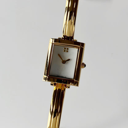 Yves Saint Laurent 1990s Seashell Dial Gold Plated Bangle Watch