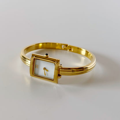 Yves Saint Laurent 1990s Seashell Dial Gold Plated Bangle Watch