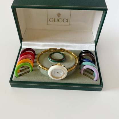 Gucci 1990s Interchangeable Bezel Gold Plated Bangle Watch with case, 12 bezels (Small)