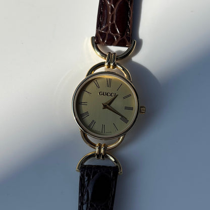 Gucci 1990s Gold Round Dial Horsebit Gold Plated Watch
