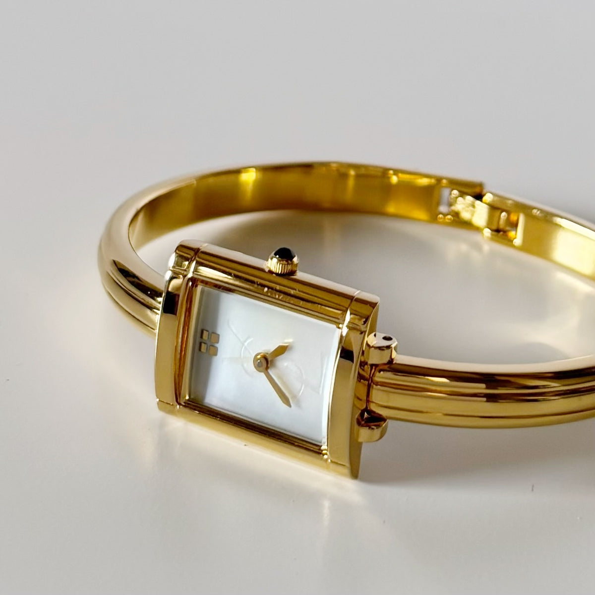 Yves Saint Laurent 1990s Seashell Dial Gold Plated Bangle Watch