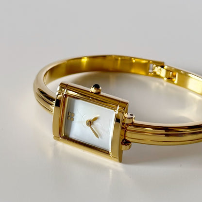 Yves Saint Laurent 1990s Seashell Dial Gold Plated Bangle Watch