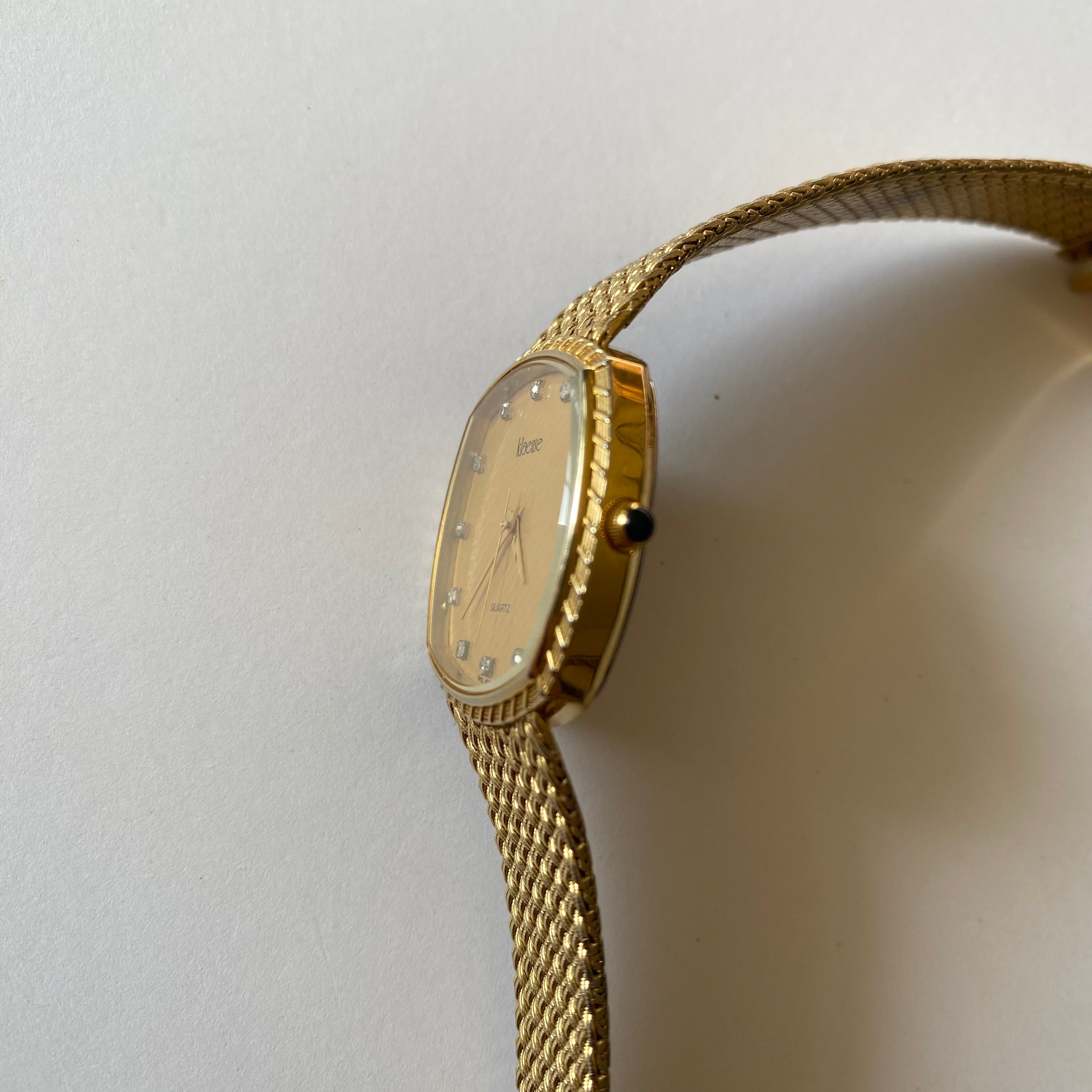 Elgin quartz gold discount watch