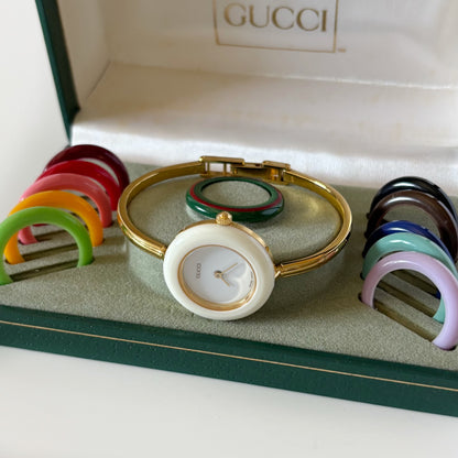 Gucci 1990s Interchangeable Bezel Gold Plated Bangle Watch with case, 12 bezels (Small)