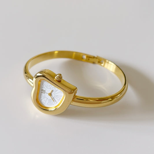 Yves Saint Laurent 1990s Heart Shaped Gold Plated Bangle Watch