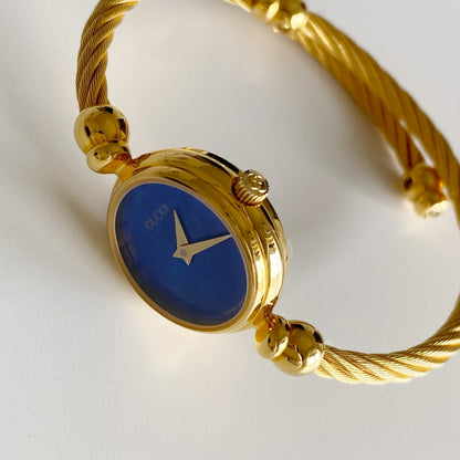Gucci 1990s Blue Dial Gold Plated Cable Bangle Watch