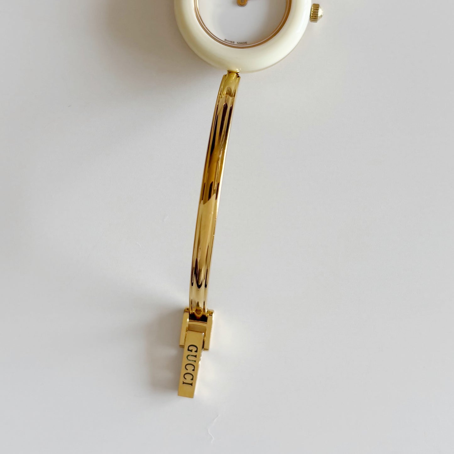 Gucci 1990s Interchangeable Bezel Gold Plated Bangle Watch with 12 bezels, case