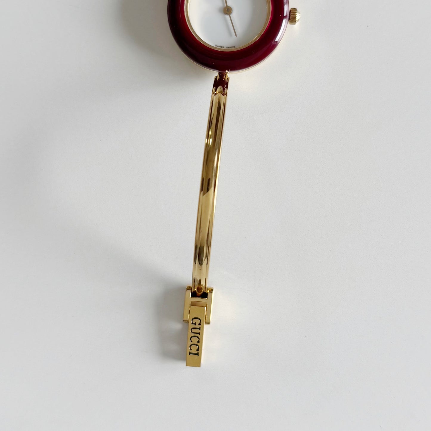 Gucci 1990s Interchangeable Bezel Gold Plated Bangle Watch with 12 bezels, case