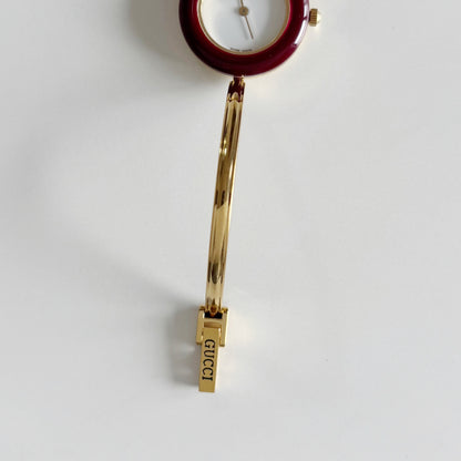 Gucci 1990s Interchangeable Bezel Gold Plated Bangle Watch with 12 bezels, case